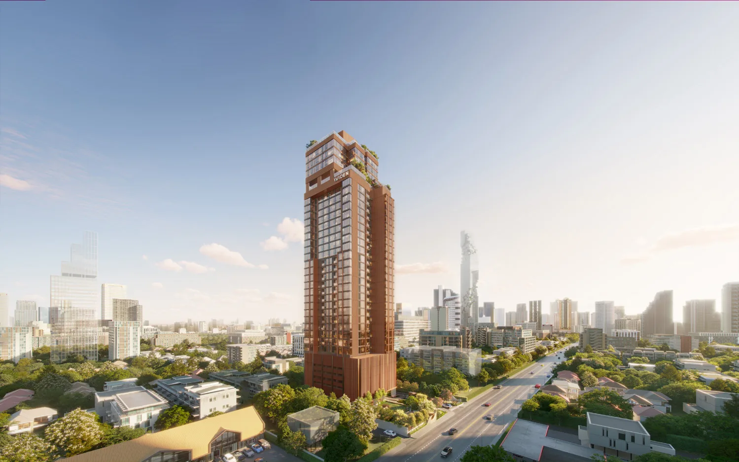 The tower seen from Nang Linchi: thirty-four storeys above a low-rise district, with the downtown skyline behind