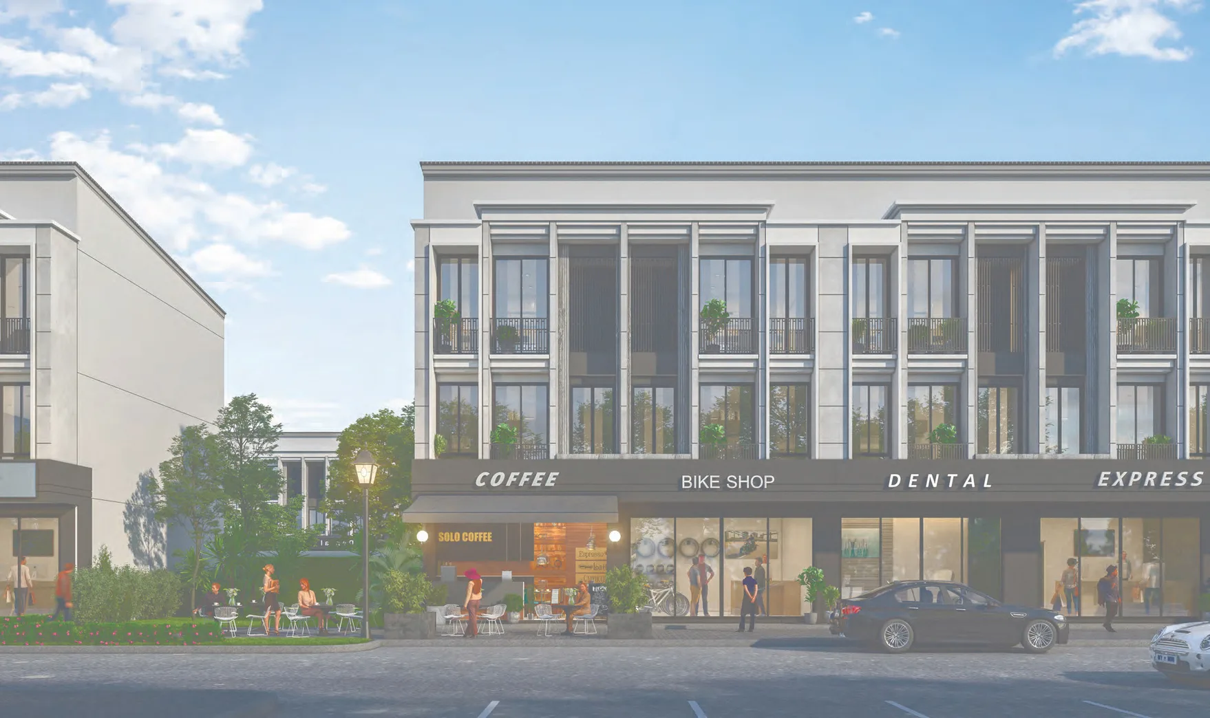 The shophouse row: ground-floor shopfronts and parking along the facade