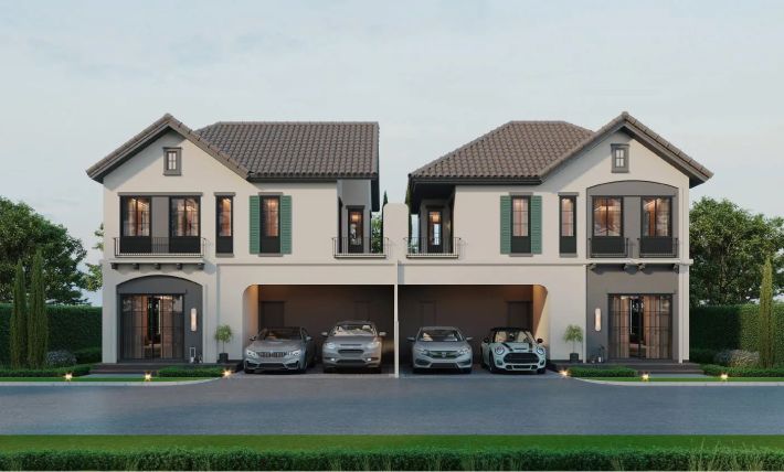 A pair of semi-detached houses with cars under the carports