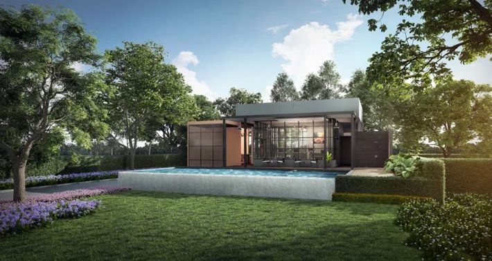 The development's clubhouse among lawns