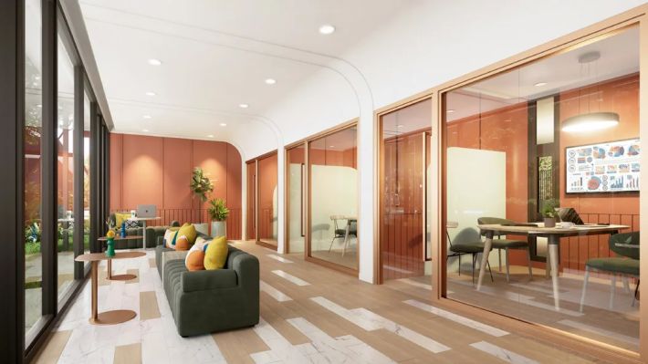 The lounge area with armchairs by the glazing