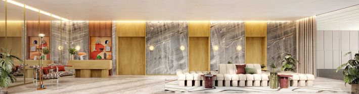 The lobby lounge with a fireplace and armchairs