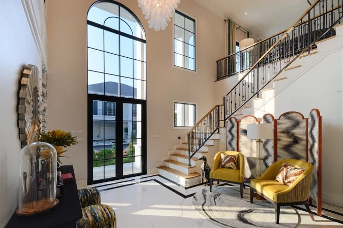 The double-height lounge with its staircase
