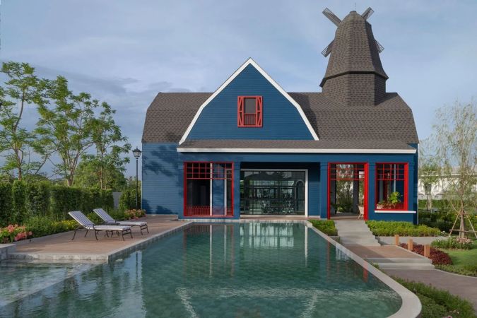 The clubhouse under the windmill, and the pool
