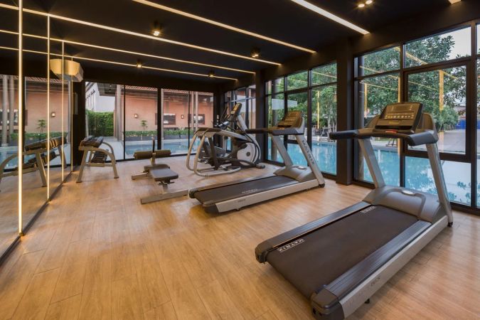 The gym overlooking the pool