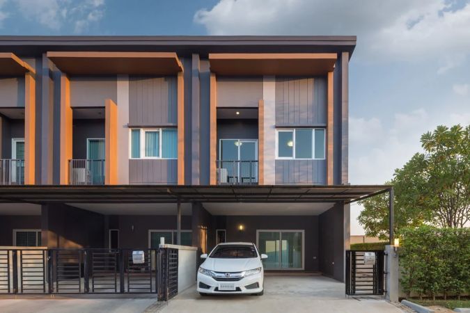 A row of townhouses with carports