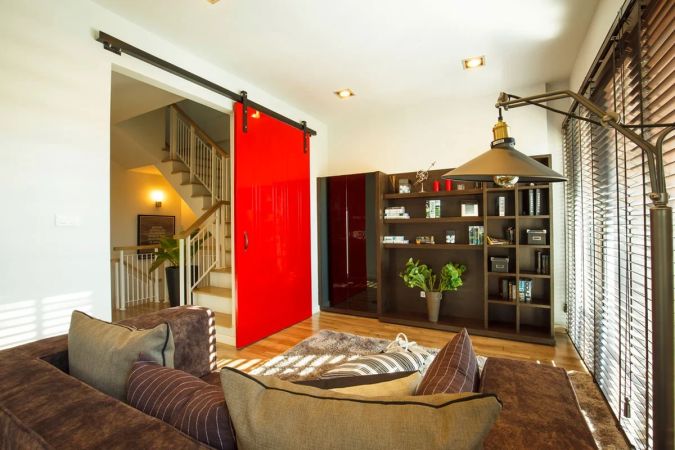 The show house living room with its red door