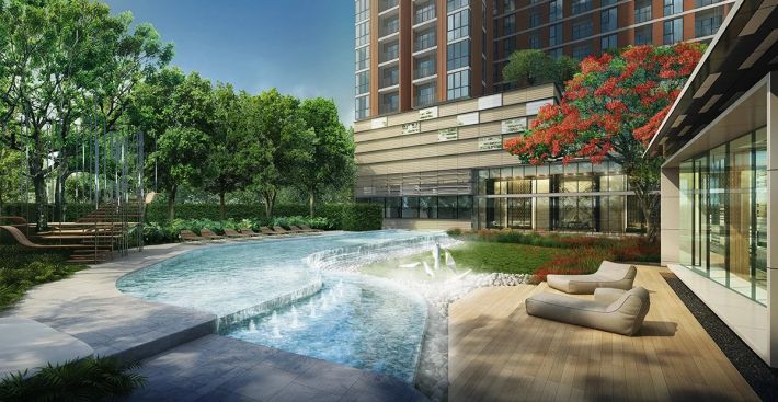 Water along the planting, loungers on the grass