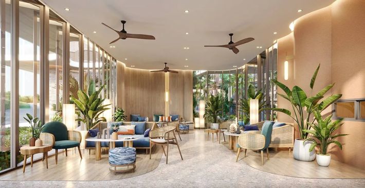 Lobby: rattan furniture, ceiling fans and greenery