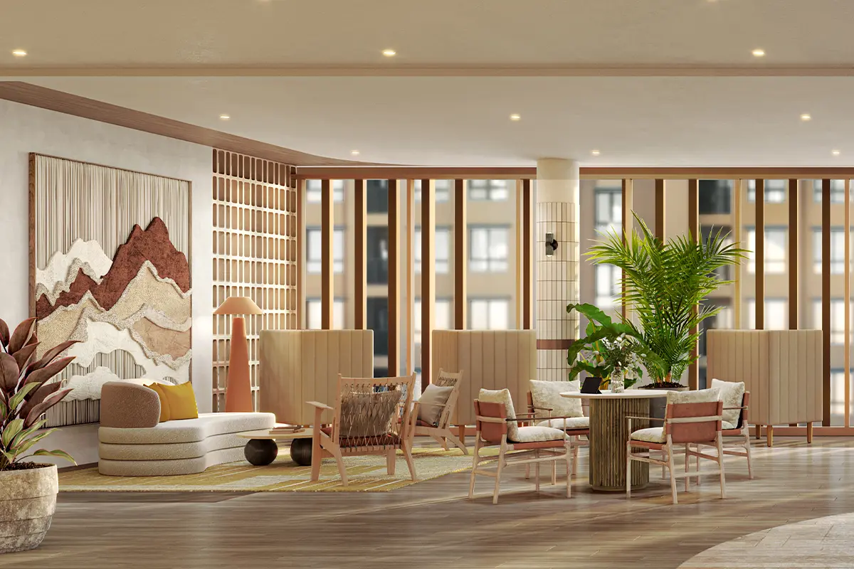 The co-working space: armchairs and a table by the window, high-backed booths and a wall panel